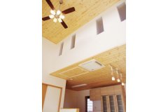 高さの異なる天井が空間に変化を生むLDK。床と同じパイン無垢材を天井にも使用している